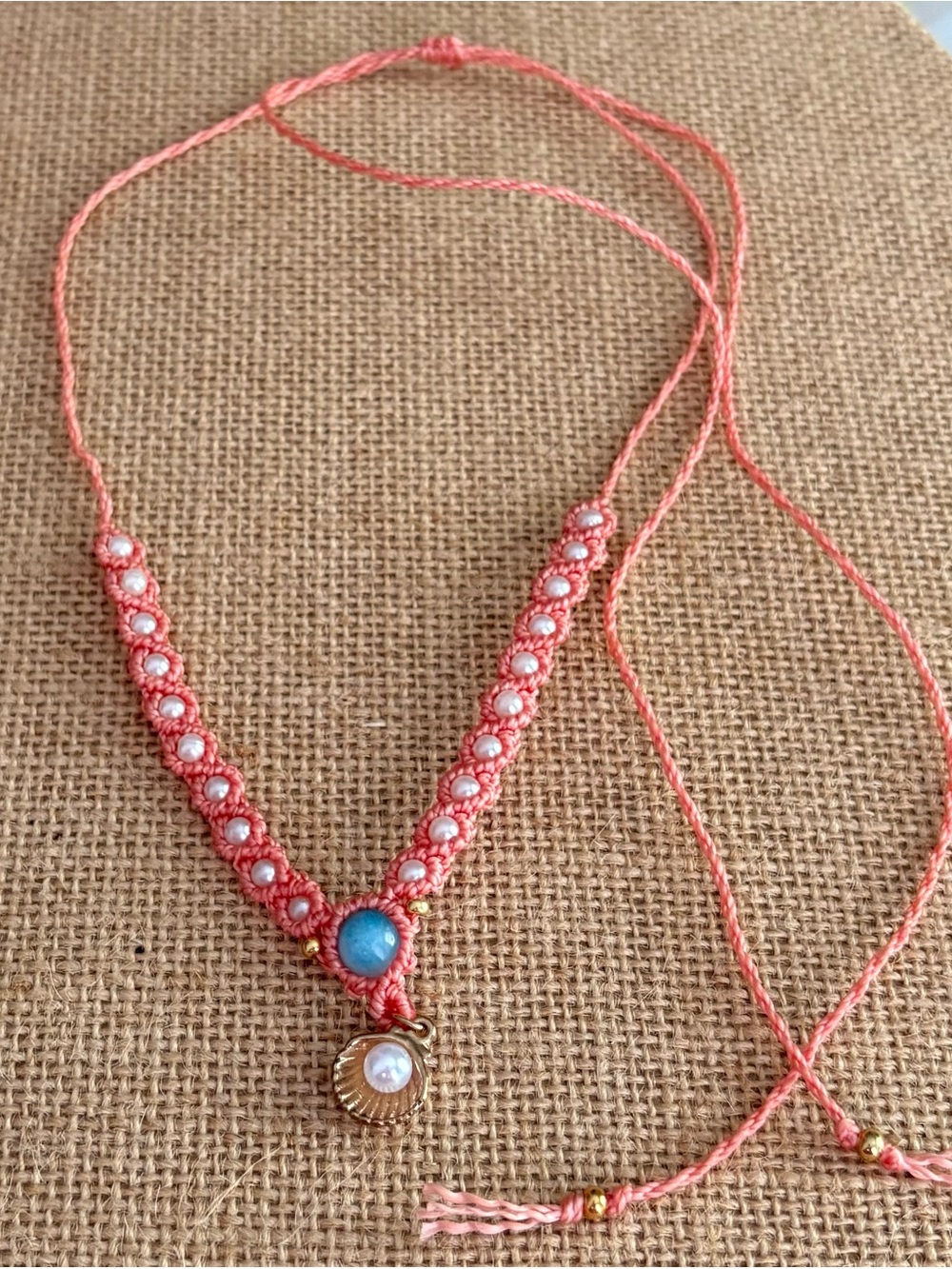 Handmade Coral Pink Beaded Macramé Necklace with Blue Stone and Pearl Charm